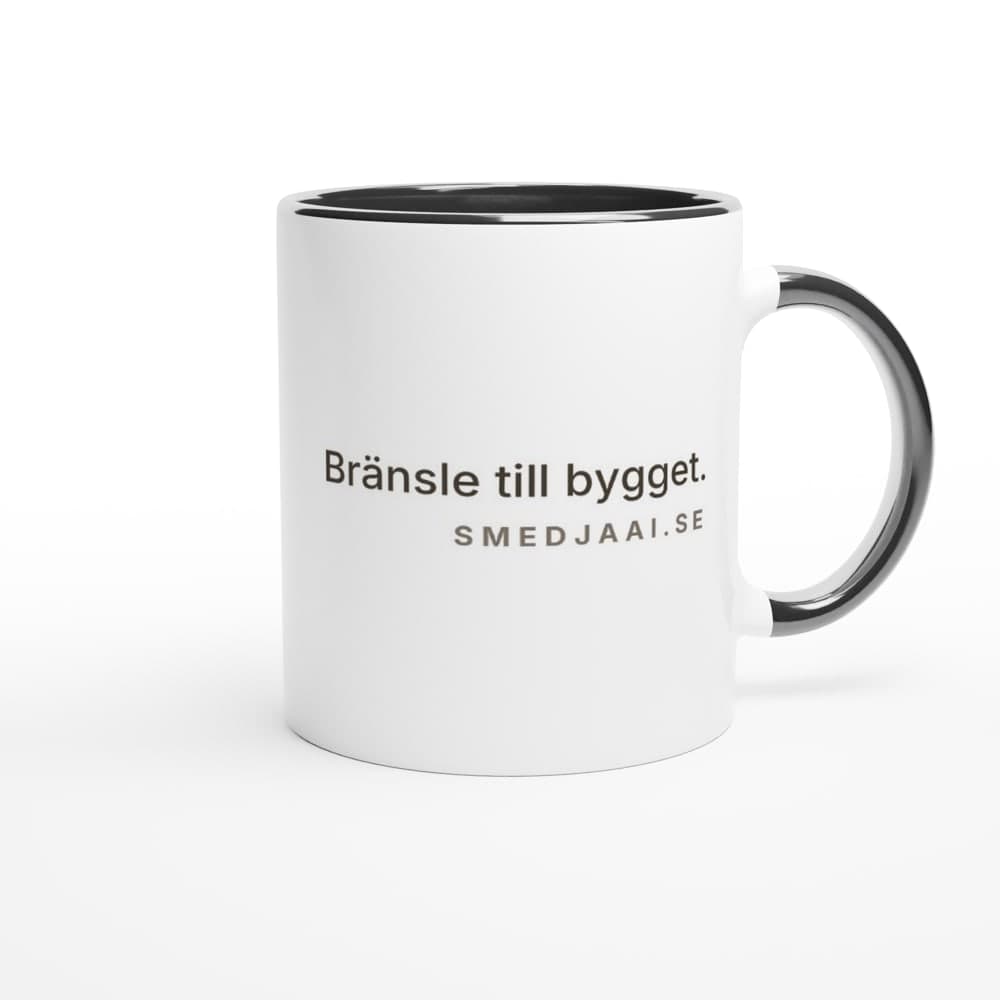 Forge Mug – vit mugg med svart insida och texten Bränsle till bygget